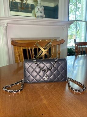 CHANEL Black Quilted Leather with Silver Hardware Wallet with Added Chain